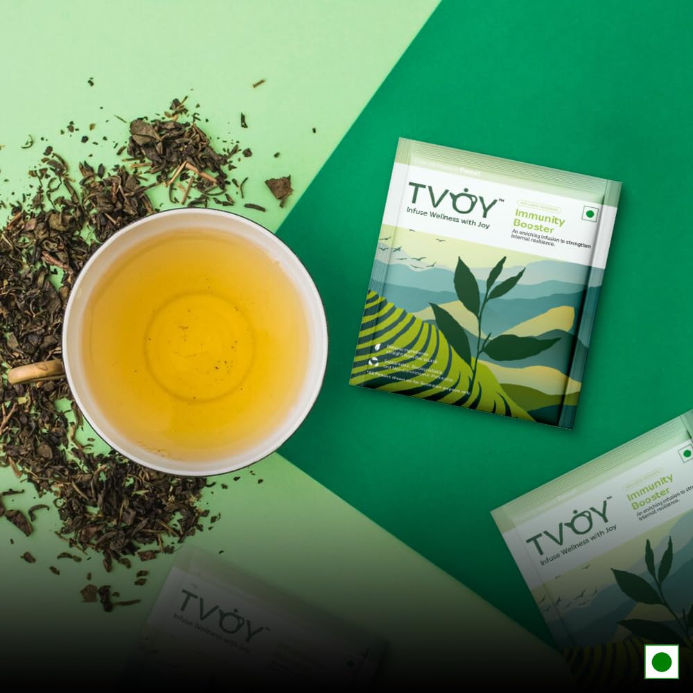 Tvoy Immunity Booster Green Tea with a cup – freshly brewed immunity-supporting green tea.